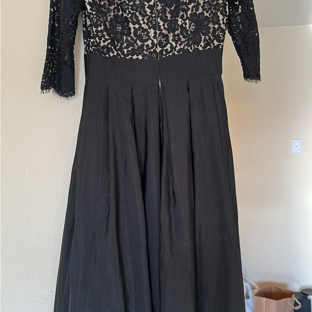 White and Black 3/4 Lace Sleeved Formal Gown. Lace & Lined Bodice. Floor Length.